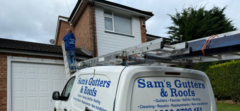 Roofer inspecting the roof